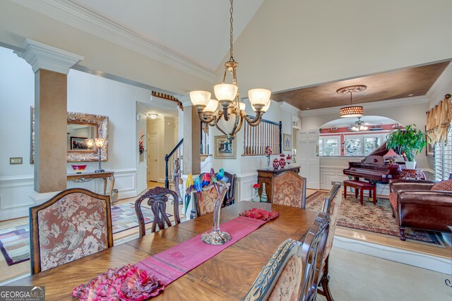 6780 Lawson Cir, Gainesville, GA 30506 - dining area with wainscoting, a decorative wall, ornamental molding, and a chandelier