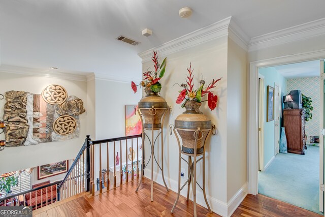 6780 Lawson Cir, Gainesville, GA 30506 - corridor with baseboards, ornamental molding, wood finished floors, and visible vents