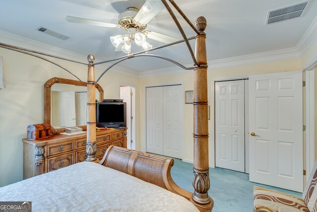 6780 Lawson Cir, Gainesville, GA 30506 - bedroom with visible vents, carpet, two closets, and crown molding