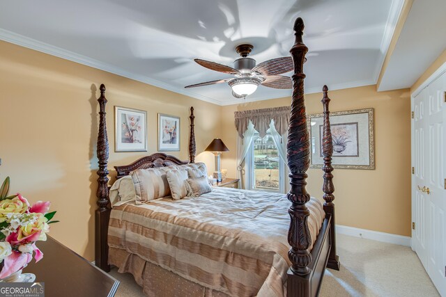 6780 Lawson Cir, Gainesville, GA 30506 - bedroom featuring a ceiling fan, ornamental molding, baseboards, and light carpet