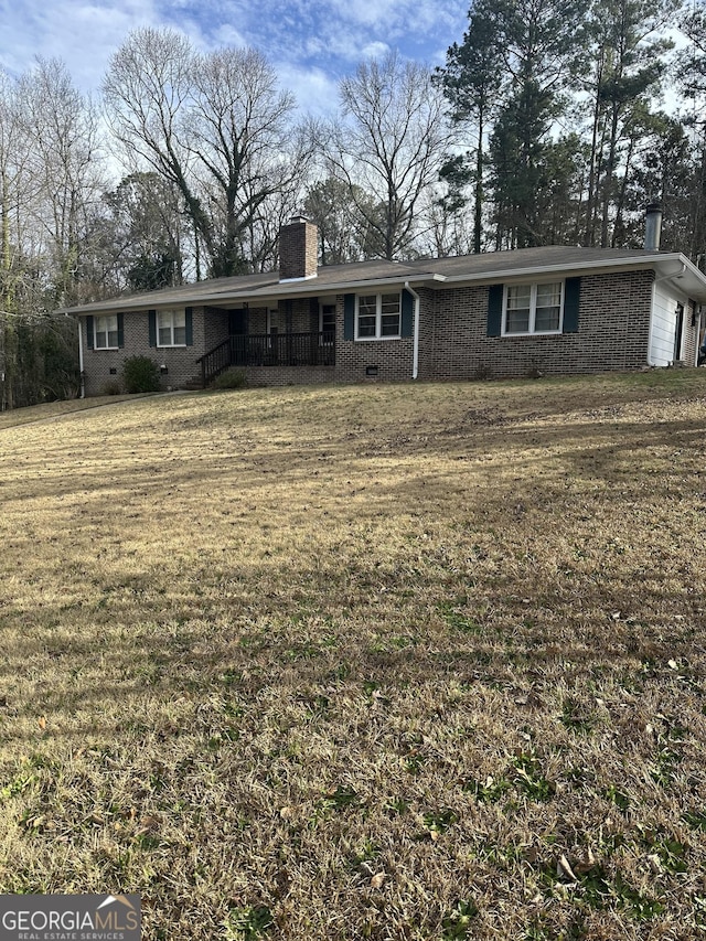 view of front of property featuring a front yard