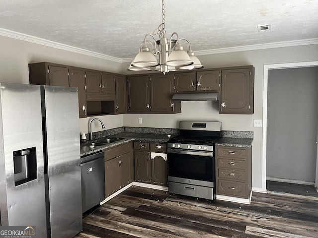 kitchen featuring crown molding, appliances with stainless steel finishes, sink, and dark wood-type flooring