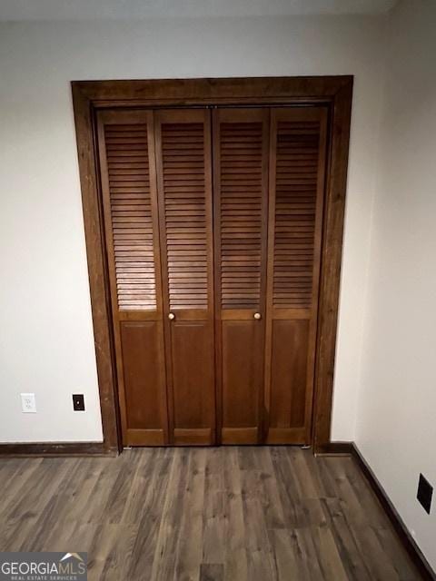 interior details featuring hardwood / wood-style floors