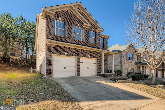 view of front of house featuring central AC and a garage