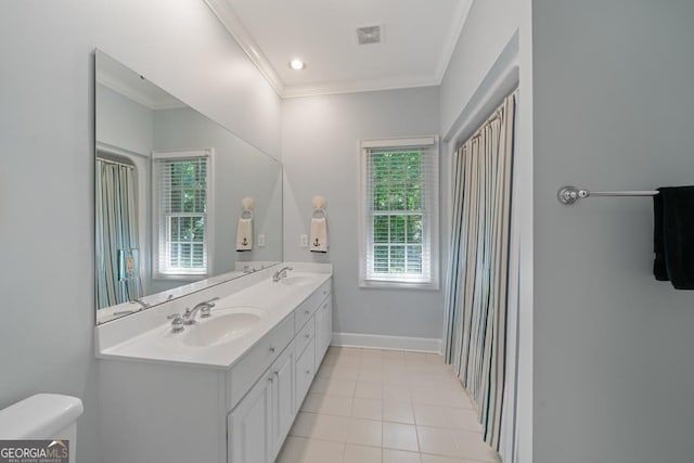 bathroom featuring vanity, crown molding, and tile patterned floors