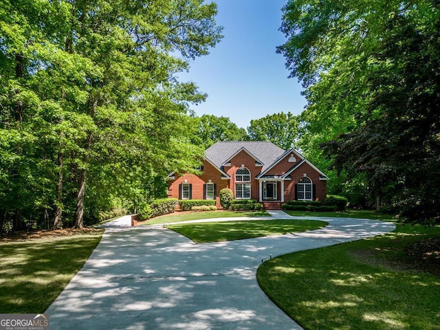 view of front of home with a front yard