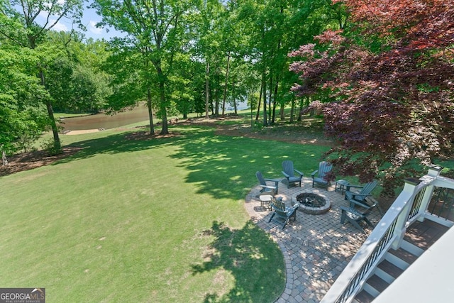 view of yard with a fire pit