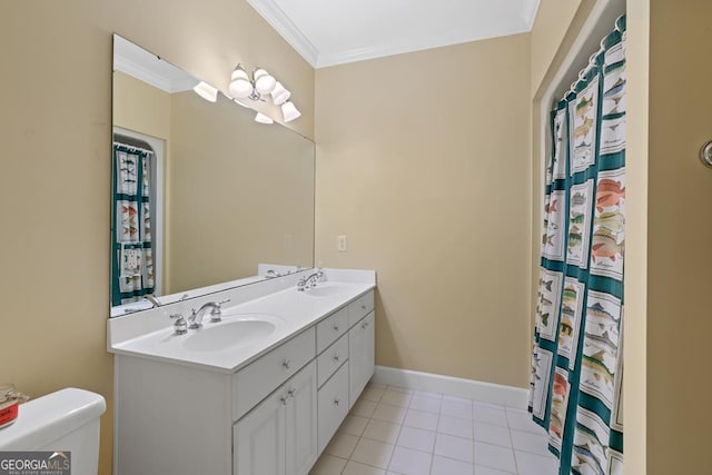 bathroom featuring ornamental molding, vanity, tile patterned floors, and toilet