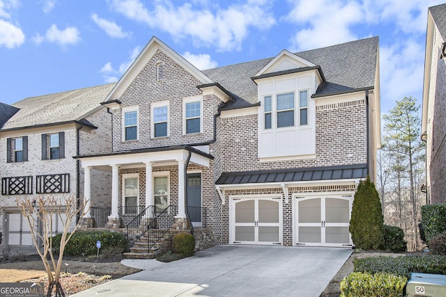 view of front of home featuring a garage and covered porch