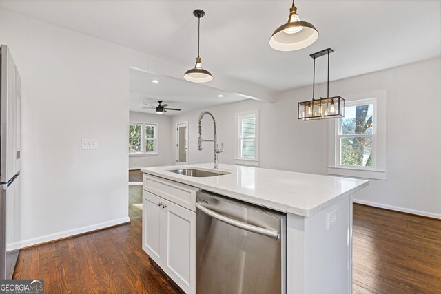 kitchen featuring sink, white cabinetry, dark hardwood / wood-style flooring, dishwasher, and an island with sink