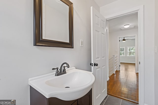bathroom with tile patterned flooring and sink