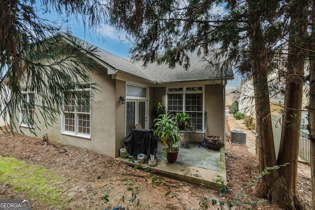 view of home's exterior featuring central AC and a patio area