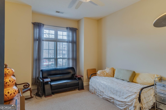 interior space featuring ceiling fan