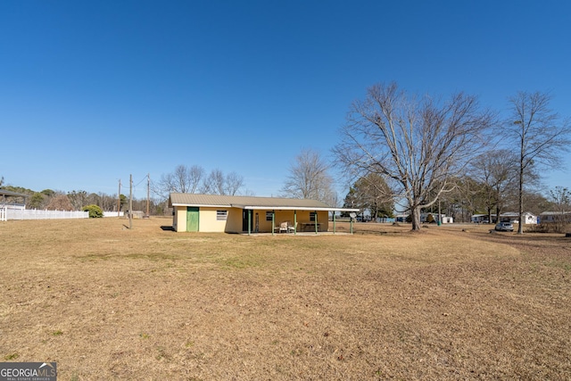 view of front facade with a front lawn