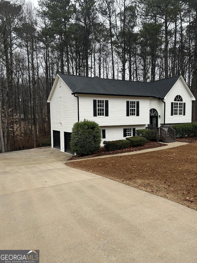 raised ranch featuring a garage