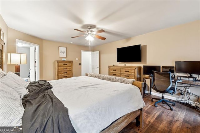 bedroom featuring ceiling fan and dark hardwood / wood-style flooring