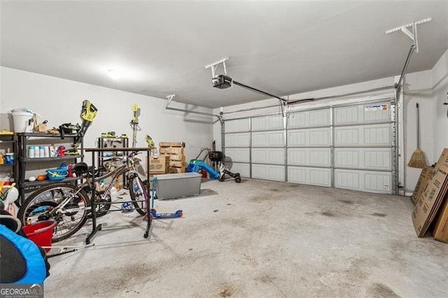 garage featuring a garage door opener