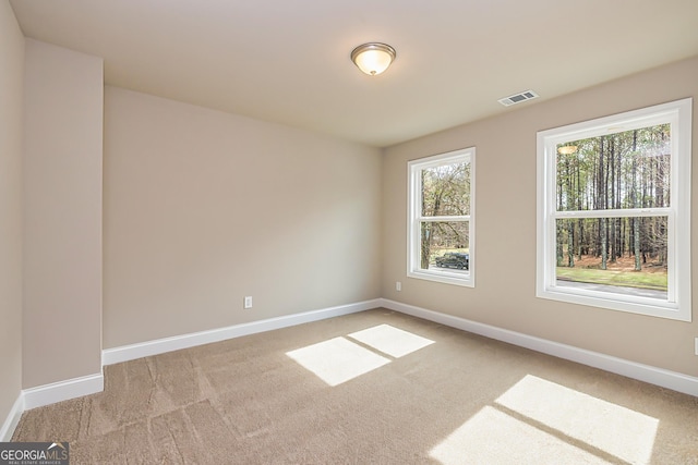 view of carpeted spare room