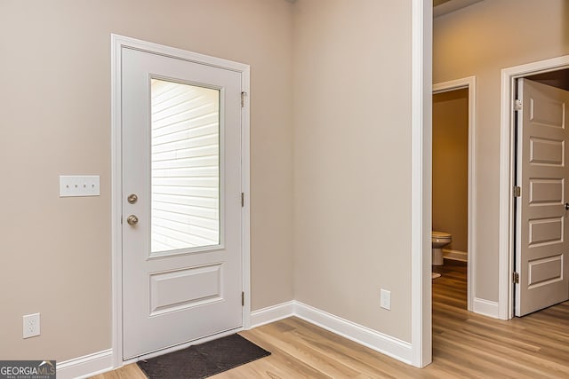 doorway to outside featuring light hardwood / wood-style flooring