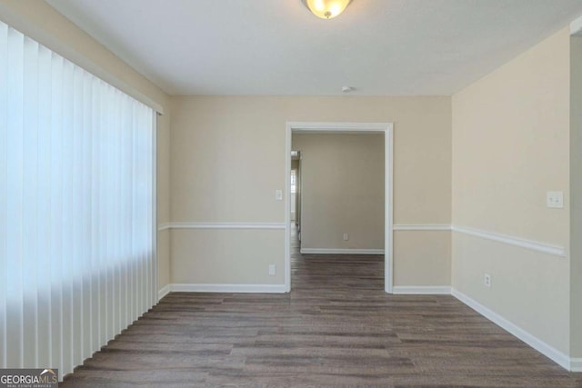 empty room featuring hardwood / wood-style floors