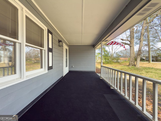 balcony featuring covered porch