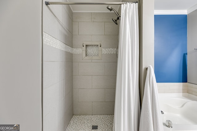 bathroom featuring plus walk in shower and crown molding