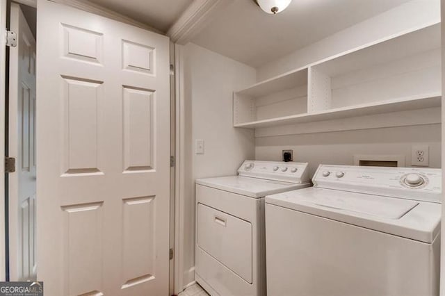 laundry area with washer and clothes dryer