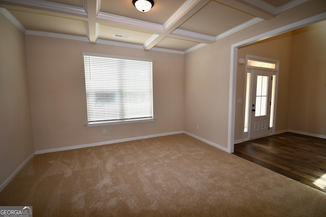 spare room with coffered ceiling, visible vents, beam ceiling, baseboards, and carpet flooring
