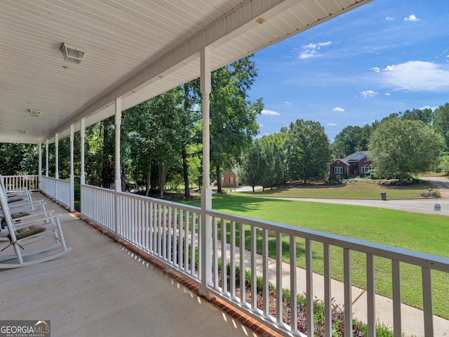 view of patio featuring a porch