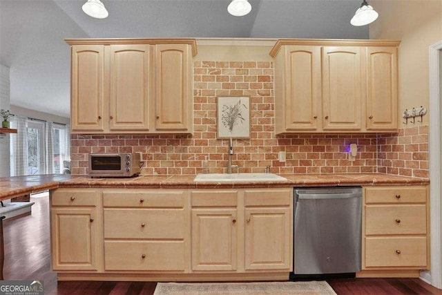 217 E Point Dr, Savannah, GA 31410 - kitchen with stainless steel dishwasher, light brown cabinetry, tasteful backsplash, and dark wood-style flooring