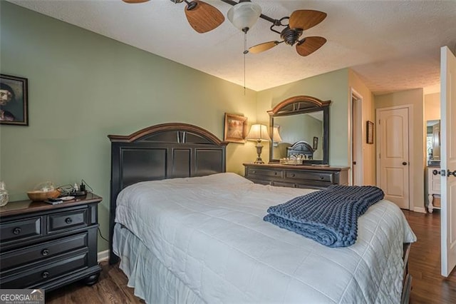 bedroom featuring dark wood-type flooring and ceiling fan