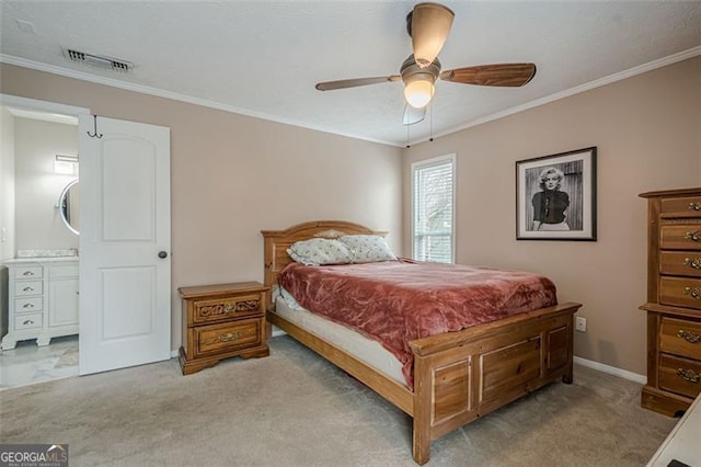 bedroom featuring crown molding, light colored carpet, and ceiling fan