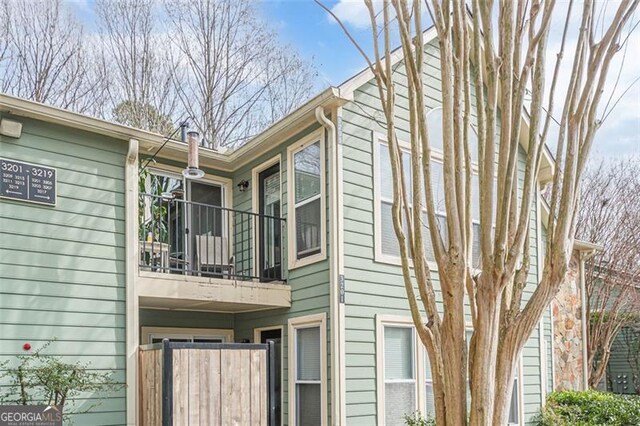 3205 Canyon Point Cir, Roswell, GA 30076 - view of property exterior featuring fence and a balcony