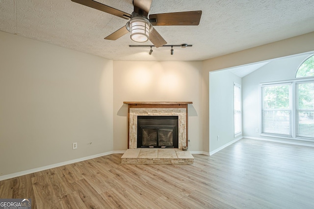 3205 Canyon Point Cir, Roswell, GA 30076 - living area with ceiling fan, a textured ceiling, and wood finished floors