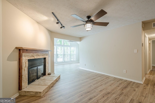 3205 Canyon Point Cir, Roswell, GA 30076 - living room featuring a ceiling fan, dark wood-style flooring, baseboards, and a textured ceiling