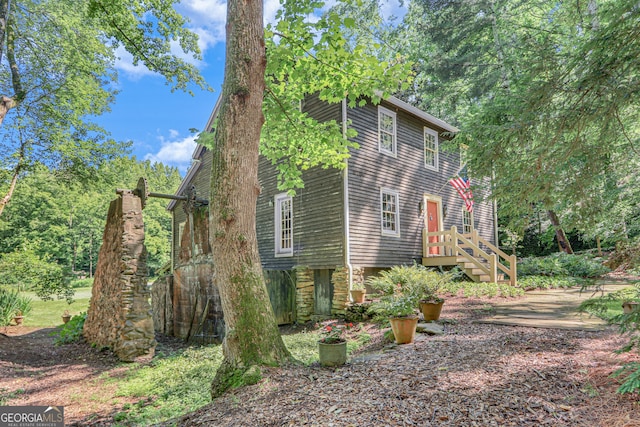 view of home's exterior with stone siding