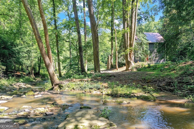 view of landscape featuring a view of trees