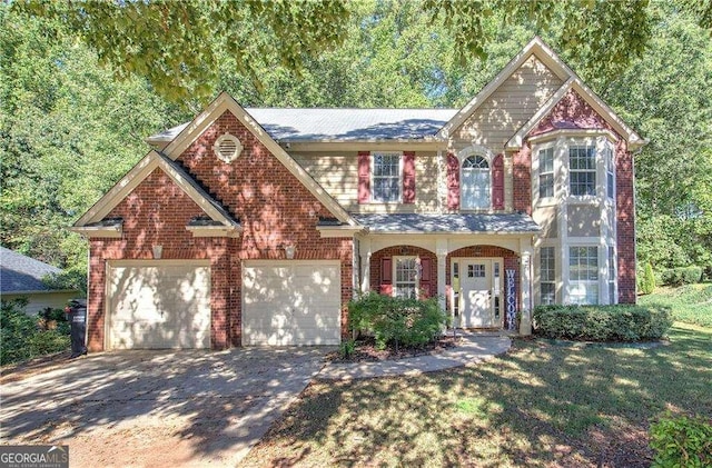 view of front property featuring a porch and a garage