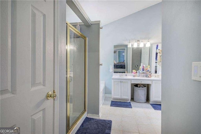 bathroom with vanity and separate shower and tub