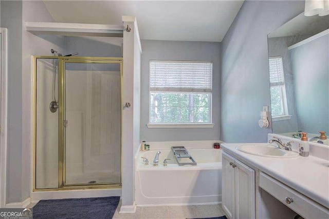 bathroom featuring vanity and separate shower and tub