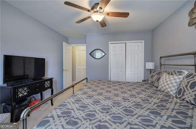 bedroom featuring ceiling fan, carpet floors, and a closet