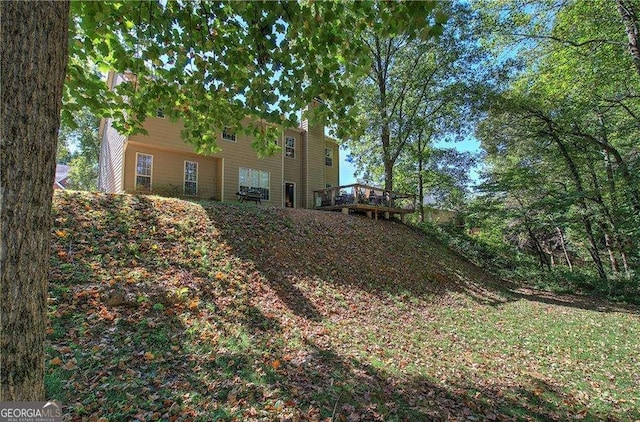 view of yard with a deck