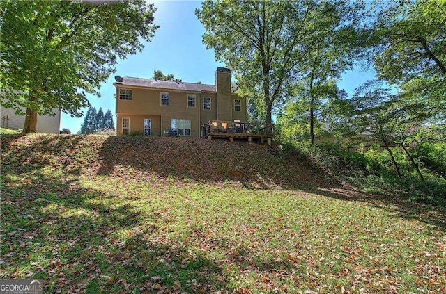 view of yard with a deck