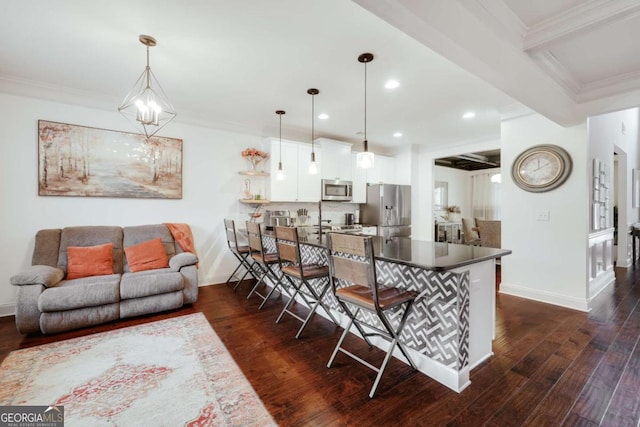 interior space featuring beam ceiling, crown molding, and dark hardwood / wood-style floors