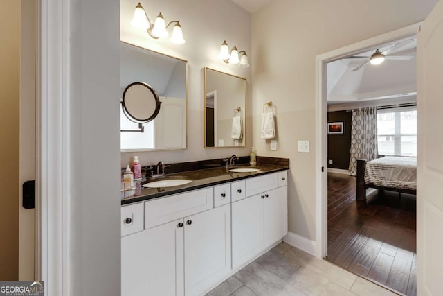 bathroom with vanity and ceiling fan