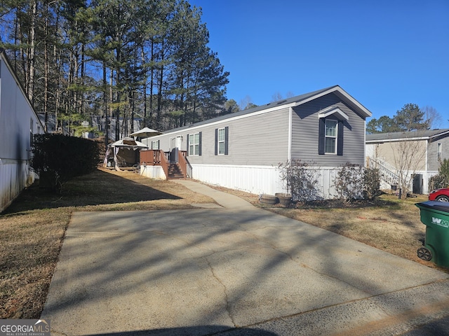 view of property exterior featuring a yard