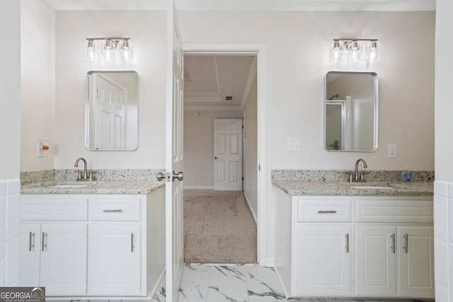 bathroom featuring vanity and a shower with shower door