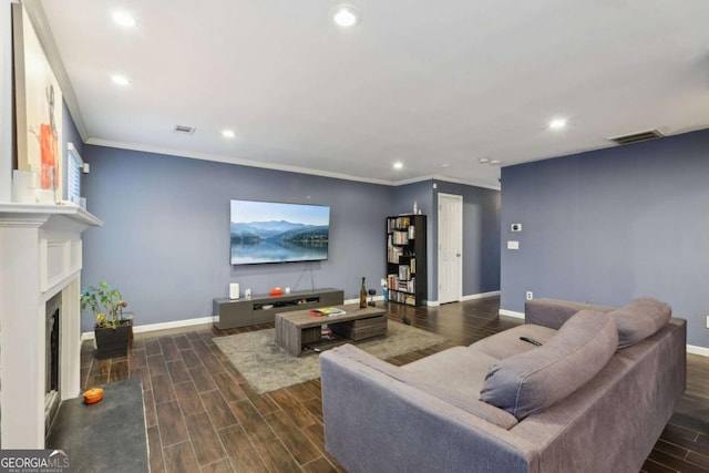 living room with ornamental molding