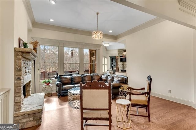 5861 Yoshino Cherry Ln, Braselton, GA 30517 - dining area with hardwood / wood-style floors, crown molding, and a fireplace