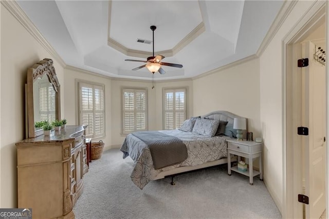 5861 Yoshino Cherry Ln, Braselton, GA 30517 - bedroom with crown molding, a tray ceiling, light colored carpet, and ceiling fan